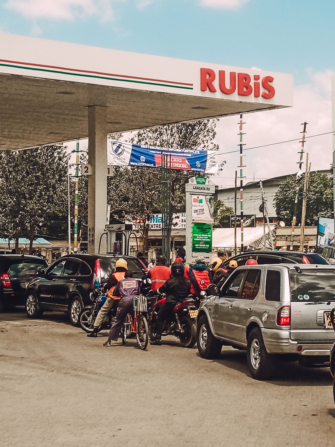 Motorists and riders at a fuel station in Nairobi, Kenya